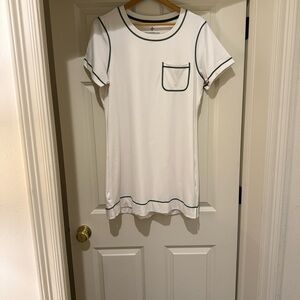 Tuckernuck white sports dress with green trim.